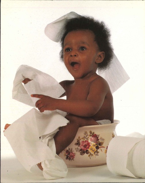 child on flowered potty